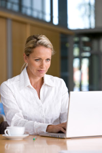 Business woman at computer, C2C Resources